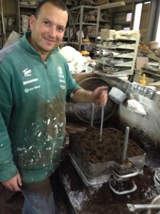 Steve Lane tamping sand  for Aluminum hat block